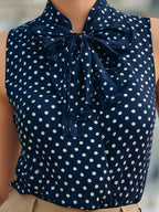 Chic Navy Blue Polka Dot Sleeveless Blouse With Bow Tie Neck