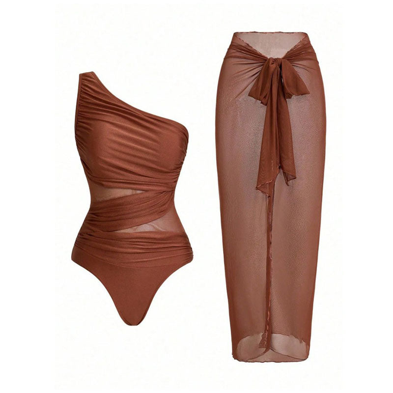One-shoulder cut-out one-piece swimsuit and mesh cover-up skirt set