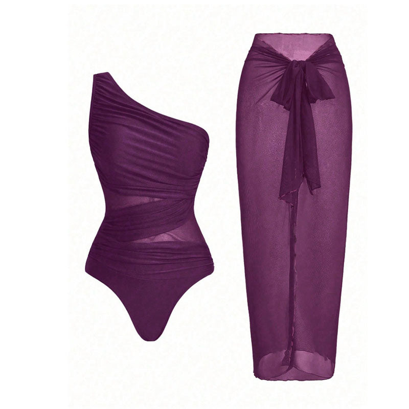 One-shoulder cut-out one-piece swimsuit and mesh cover-up skirt set